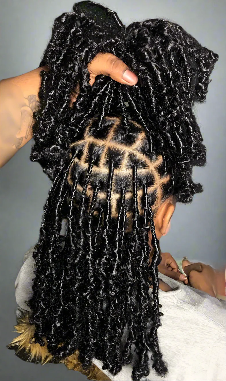 Detailed view of black loc hairstyle with precise grid-like parting